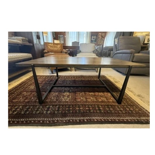 Clean-lined and versatile, this contemporary coffee table features a warm-toned ash wood top with beautiful visible grain...