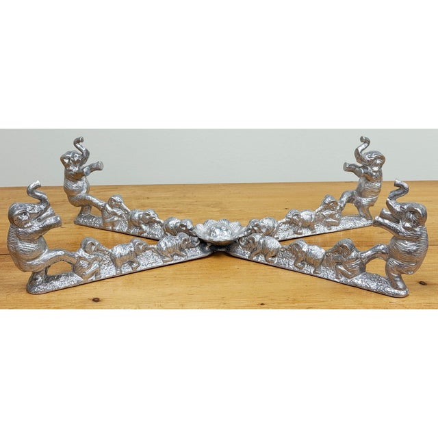 Vintage aluminum Arthur Court "Elephants" casserole stand. Sand cast aluminum is designed to hold a 13" x 9" casserole...