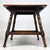A handsome early 20th-century English side table, finely crafted from oak and distinguished by its elegant turned legs,...