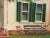 Original, unstretched oil on canvas painting by David Beynon Pena of this green bench in front of a white house is where...