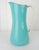 1950s Kobenstyle Teal Enamel Pitcher with Cord Wrapped Handle as designed by Jens Quistgaard for Dansk. Base is hallmarked...