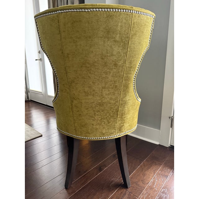 Beautiful Ethan Allen dining chairs with extensive nail head trim in a beautiful moss green velvet. They add a lot of...