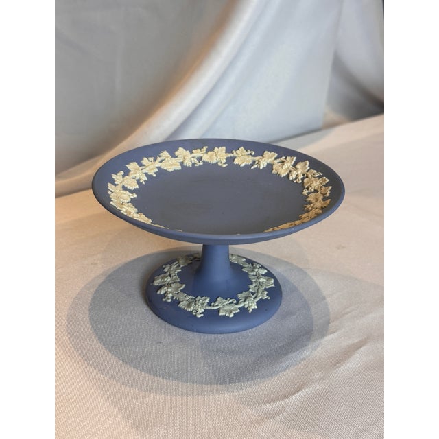 A beautiful serving bowl from the vintage "Sacrifice" pattern of Wedgwood Jasperware in the iconic pale blue and white...