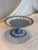 A beautiful serving bowl from the vintage "Sacrifice" pattern of Wedgwood Jasperware in the iconic pale blue and white...