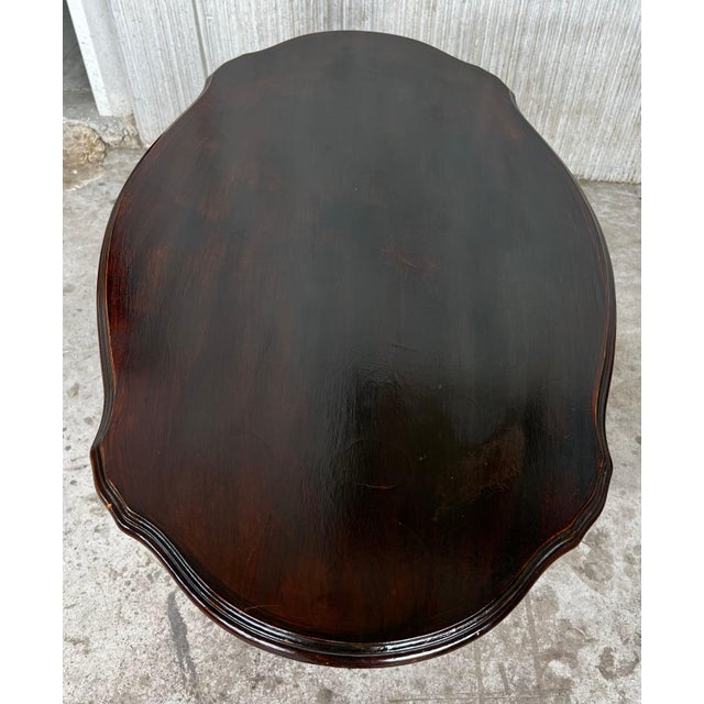 20th century Spanish Mariano Garcia carved pedestal coffee table.