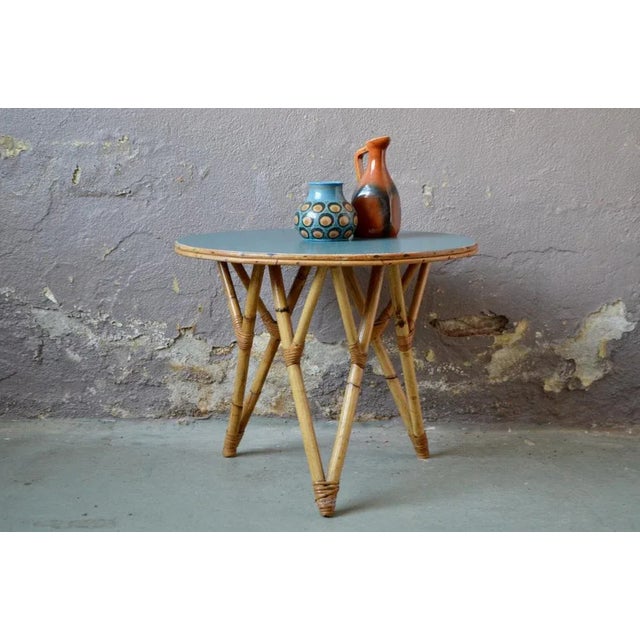 Immersed in stormy blue with this pretty rattan coffee table. The room dates from the 1970s and has been brought up to...