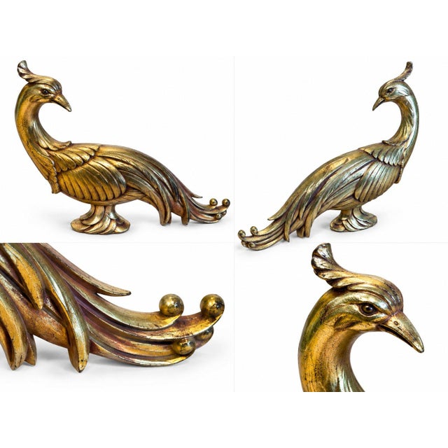 Elegant peacock figurine featuring a graceful curved neck, detailed feathers, and a beautifully sculpted flowing tail. The...