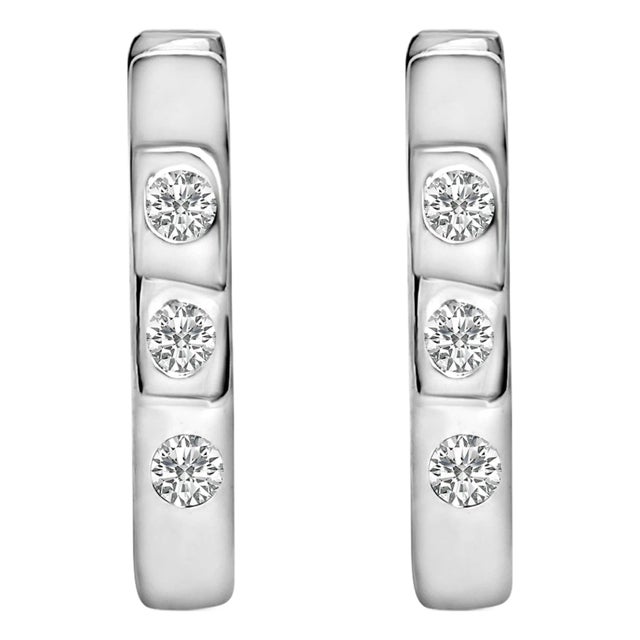 10K White Gold 1/10 Cttw Three Stone Lab Grown Diamond Oval Huggies Hoop Earrings For Sale