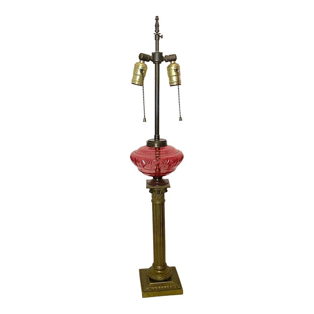 Antique Ornate Gilt Bronze Cranberry Cut Glass Electrified Oil Pillar Table Lamp For Sale