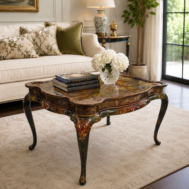 This elegant Maitland-Smith coffee table blends Queen Anne curves with rich hand-painted chinoiserie decoration. Crafted...