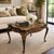This elegant Maitland-Smith coffee table blends Queen Anne curves with rich hand-painted chinoiserie decoration. Crafted...