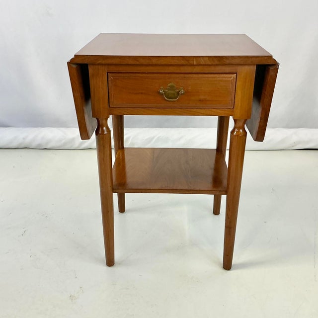 We love the round tapered legs of this Drop Leaf Side Tables. It’s crafted from teak wood and finished in a natural medium...