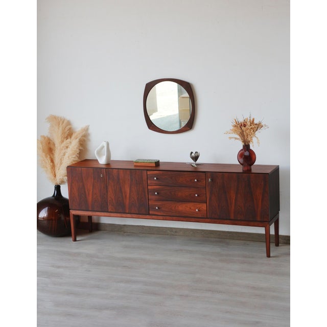 Looking for a statement piece for your home? This vintage sideboard, called the Palette Sideboard, will meet your...