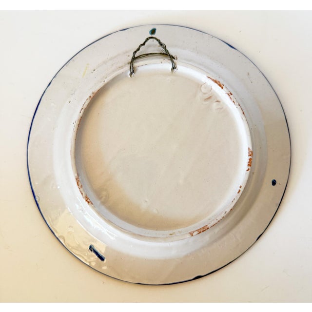 This is a fantastic example of Ceramica de Fajalauza. This is a hand painted decorative plate made in Granada, Spain. The...