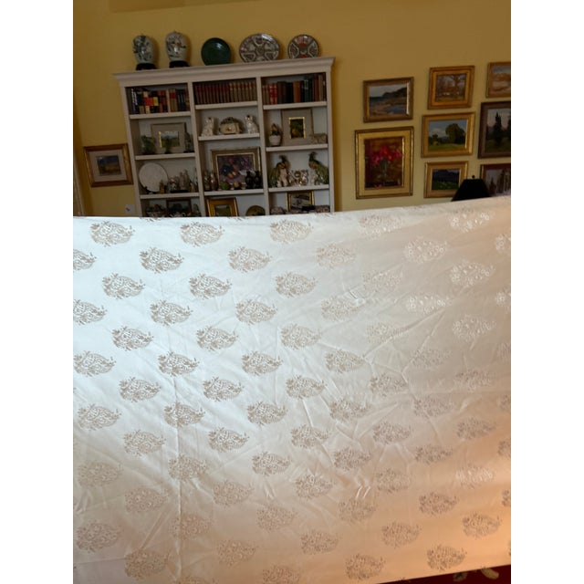 Two (2) Waterford table cloths, both 50” W x 210” L available for $70 each or $130 the pair. Beautiful satin-like fabric...