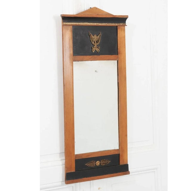 This Swedish Empire-style trumeau exudes a simple refinement in its symmetry and composure. A low pediment sits atop a...