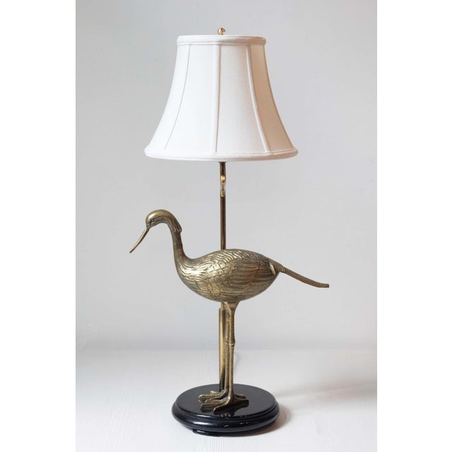 This 20th-century French lamp is a charming example of functional artistry, blending naturalistic and decorative elements....