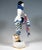Very rare porcelain figurine after the dancer lena amsel: dancer in an exotic pierrot costume with a zigzag pattern, with...