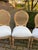 This coordinated set of four French dining chairs dates to the 1970s and presents the elegant proportions and classical...