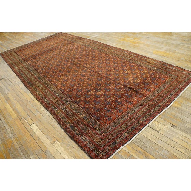 Early 20th Century N.W. Persian Gallery Carpet ( 6' x 13' - 183 x 396 ) Allover floral lattice pattern on red background....