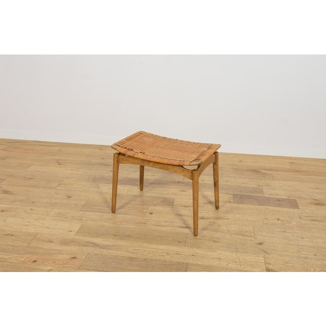 This stool was designed by Sigfrid Omann for the Danish furniture manufacturer Ølholm Møbelfabrik during the 1950s. The...