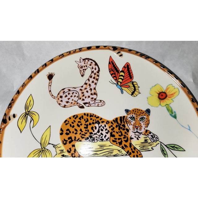 What fun with the Lynn Chase Jungle Jubilee collection serving platter, monkey and McCaw parrot watching over your meal,...