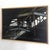 Contemporary Seeking Solace by Linda Delahaye | Oil on panel Woman standing in an industrial building interior. For Sale - Image 3 of 5