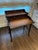 The Kaye campaign-style flip-top desk from Theodore Alexander combines classic brass campaign hardware with a rich leather...