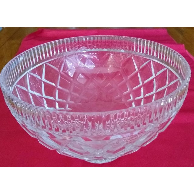 Cut glass in diamond and star patterns. Weighs 6.2 pounds.