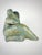 A striking one-of-a-kind hand-built studio ceramic sculpture depicting a reclining female figure in an expressive...