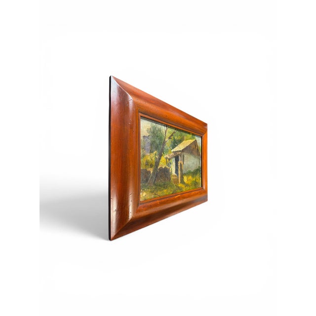 “Paysage” is an evocative signed oil on canvas depicting a secluded rural dwelling surrounded by dense vegetation. Richly...