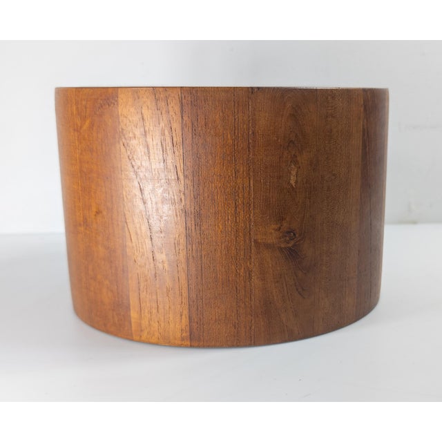 We are selling this great looking Mid-Century Modern teak ice bucket. The bucket has original lid and simple elegant...