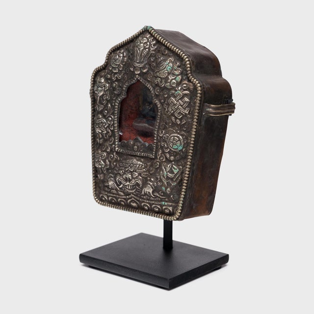 Tibetan traveling shrines, known as Gau, were believed to offer protective powers and were used to hold and carry sacred...