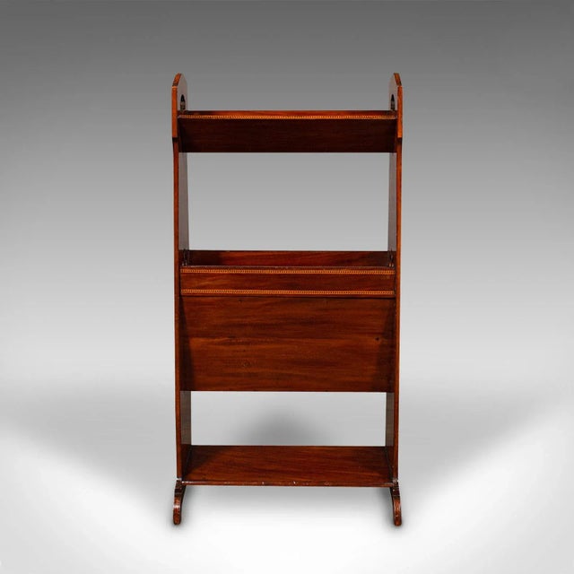 This is an antique Arts & Crafts book stand. An English, mahogany magazine rack or Canterbury, dating to the Edwardian...