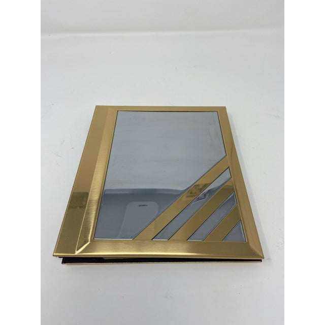 Postmodern chrome and brass picture album in original condition . Manufactured by Melannco international LTD ....