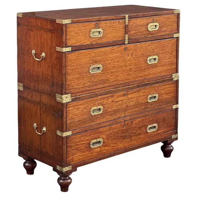 A handsome British military officer’s Campaign Ware chest of drawers or dresser, from the 19th century, featuring a...