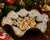 Celebrate the season with this charming vintage scalloped glass serving bowl featuring beautifully detailed gold Christmas...