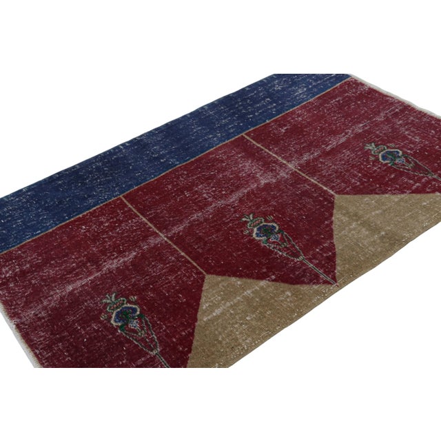 Hand-knotted in wool, this distressed vintage 4x6 Turkish rug, which is inspired by Saf rugs, a particular kind of prayer...