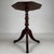 An elegant 19th-century English side table, finely crafted from mahogany and distinguished by its beautifully shaped...
