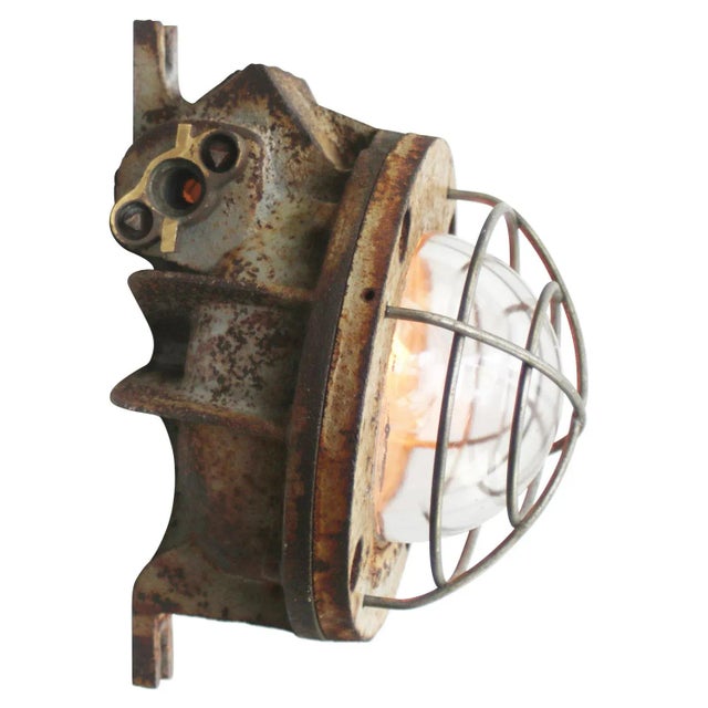 French industrial scone, cast iron wall light by ch. & g. Grimmeisen, paris, france rust brown cast iron with clear...