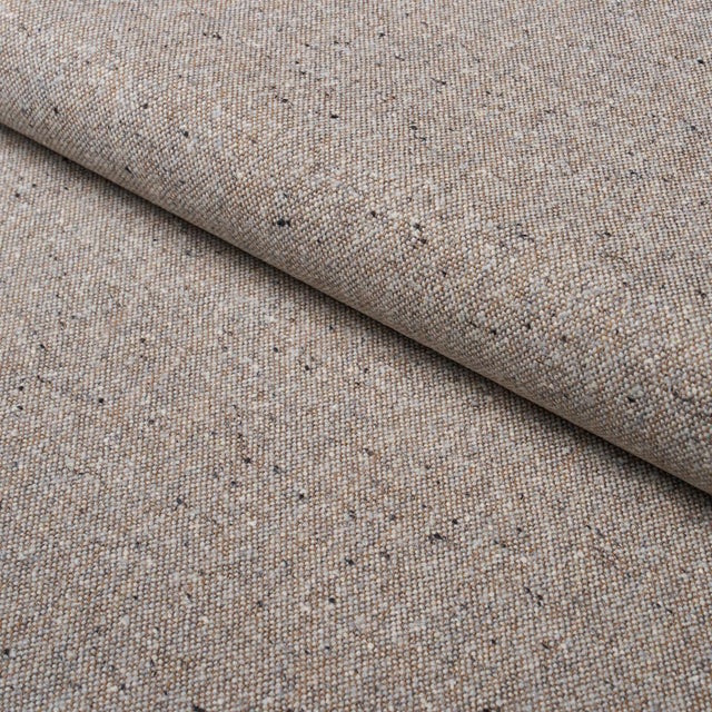 Woven in Italy, Clarke Donegal Wool Blend is a timeless flecked tweed rooted in the tradition of Irish textile...