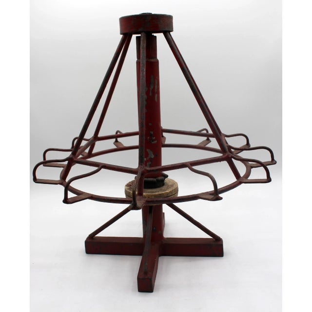 A 1920's American salesman's sample of a playground tilting seat swing in orignal paint with a custom made wall bracket...