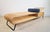 This stunning daybed showcases exceptional Danish design with a sleek construction of solid curved ash and a powdered...