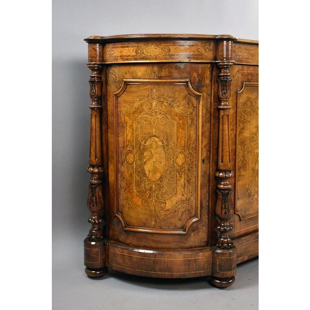 Victorian Burr Walnut Marquetry Credenza A fine Victorian burr walnut credenza, beautifully shaped and richly decorated...