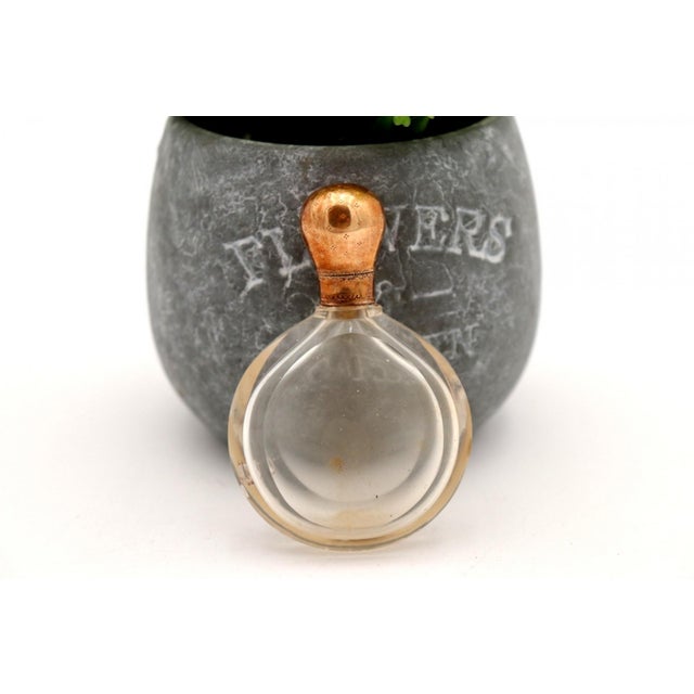 Perfume Bottle in Glass and 15 Karat Gold, in Worn conditions. Designed 1890 to 1919