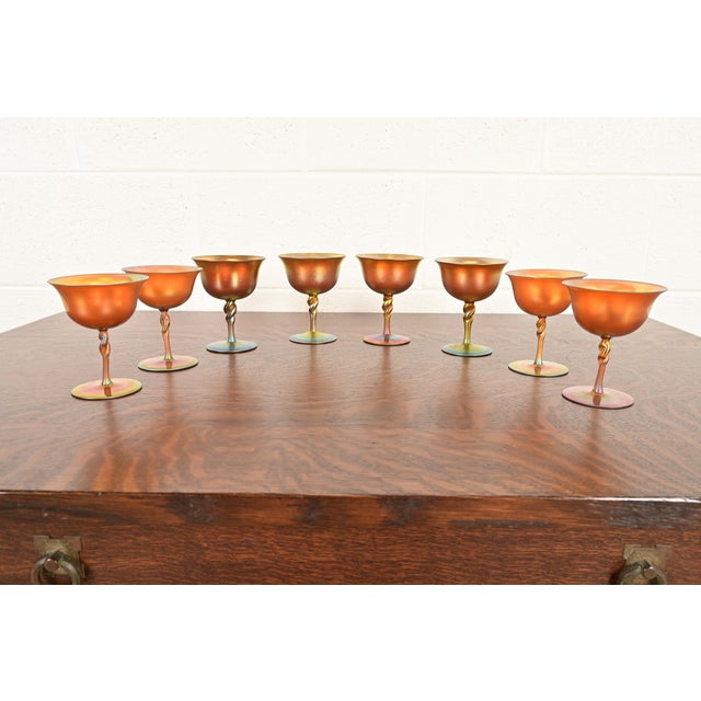 A gorgeous set of eight Arts & Crafts or Art Nouveau period Aurene iridescent art glass goblets By Steuben Glass USA,...