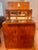 • A pristine, beautifully refurbished 1960 Art Deco cocktail cabinet manufactured by Rivington Product London. The...