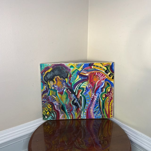 Add a burst of color and emotion to your collection with this vibrant vintage abstract figurative painting, signed by the...