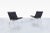 An enduring icon of Danish Modern design, this early example of PK22 lounge chairs was designed by Poul Kjaerholm and...