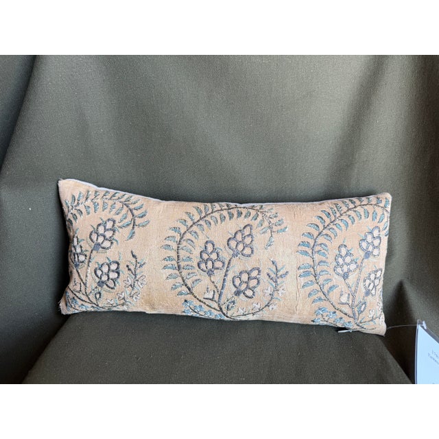 This exceptional lumbar pillow incorporates an authentic 17th-century Isfahan embroidery, showcasing finely executed...